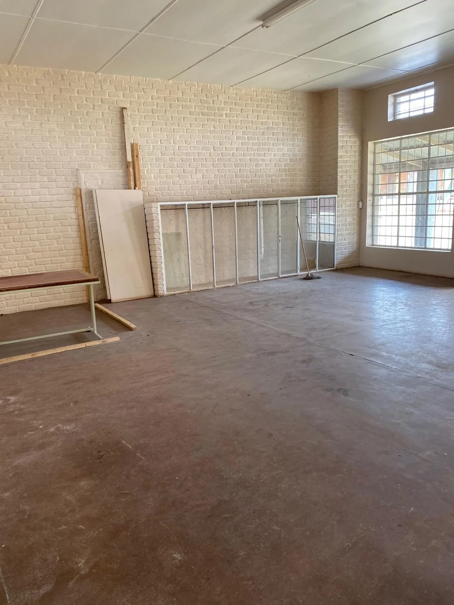 Building for three shops or offices for sale.