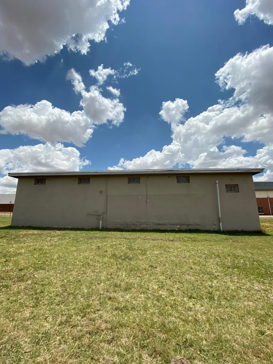 Building for three shops or offices for sale.