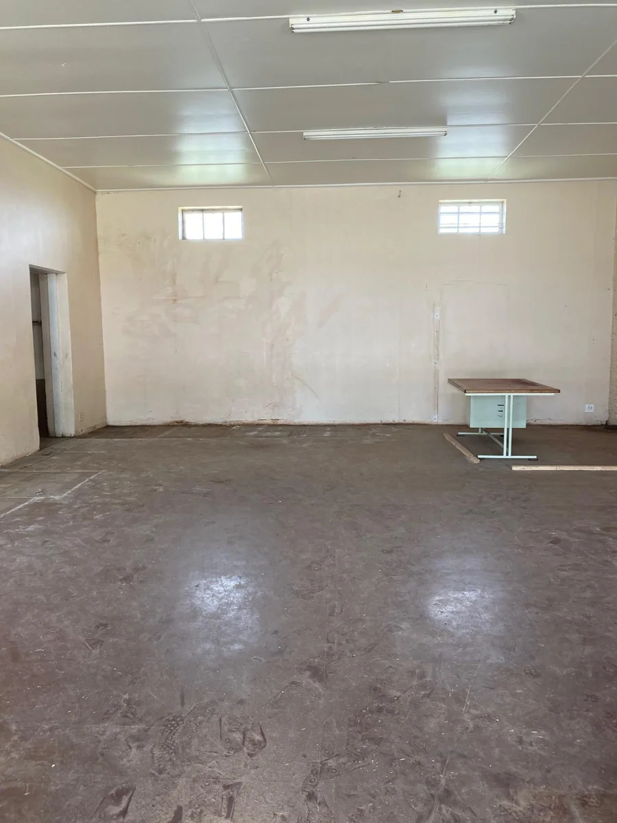 Building for three shops or offices for sale.