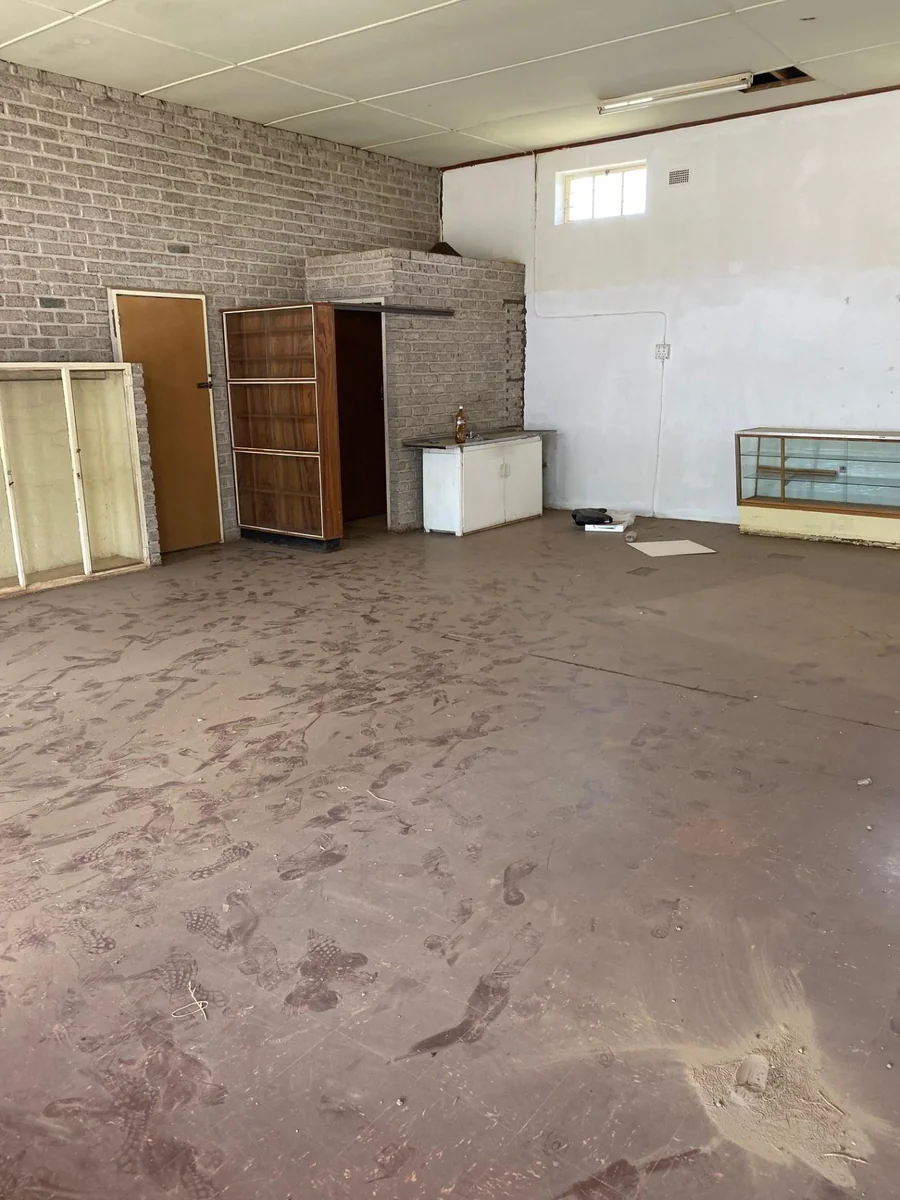 Building for three shops or offices for sale.