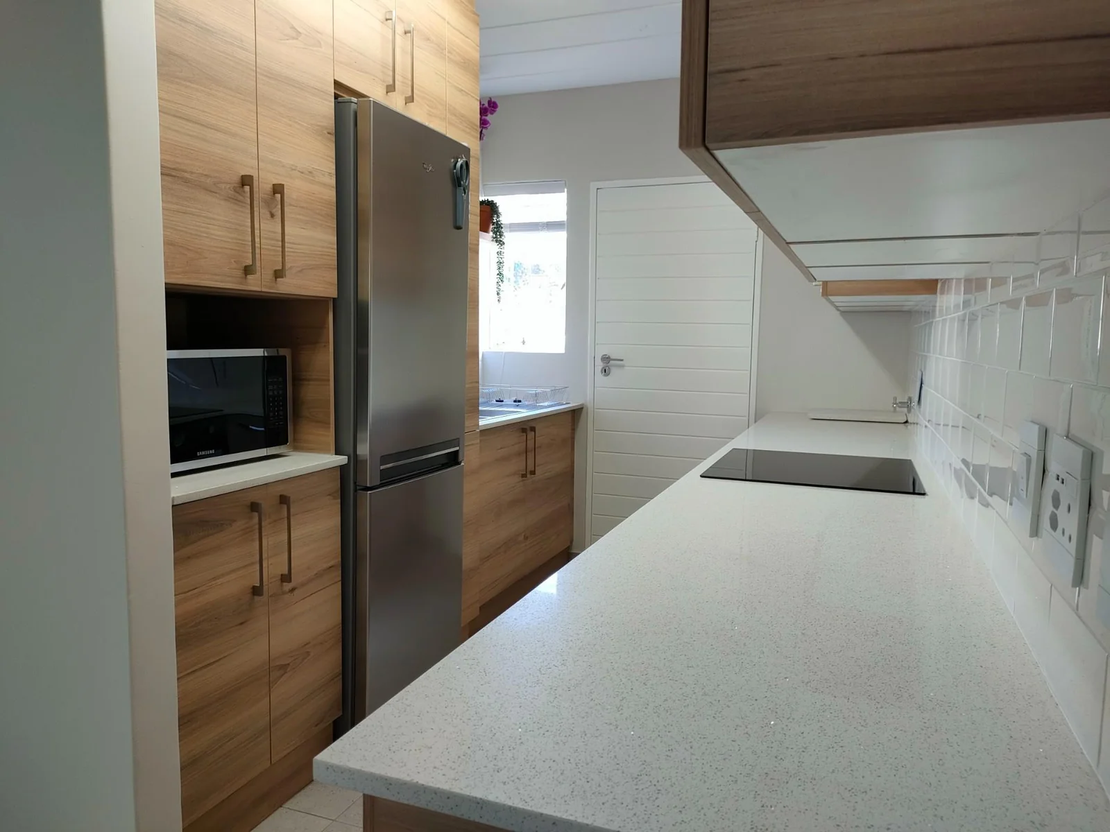 Renovated townhouse to let in access controlled complex.