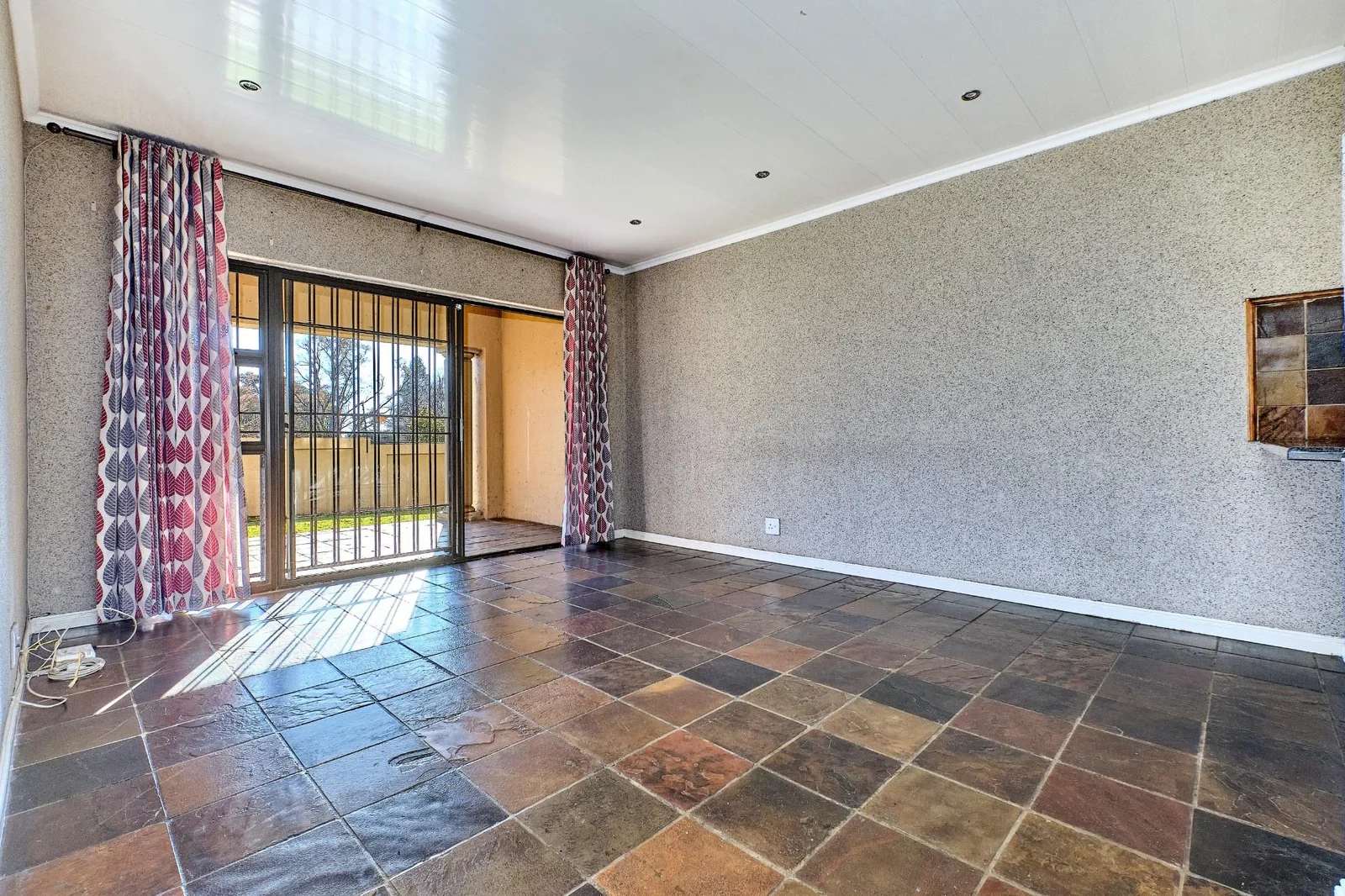A Three- Bedroom Ground Floor Apartment in Weltevreden Park For Sale.
