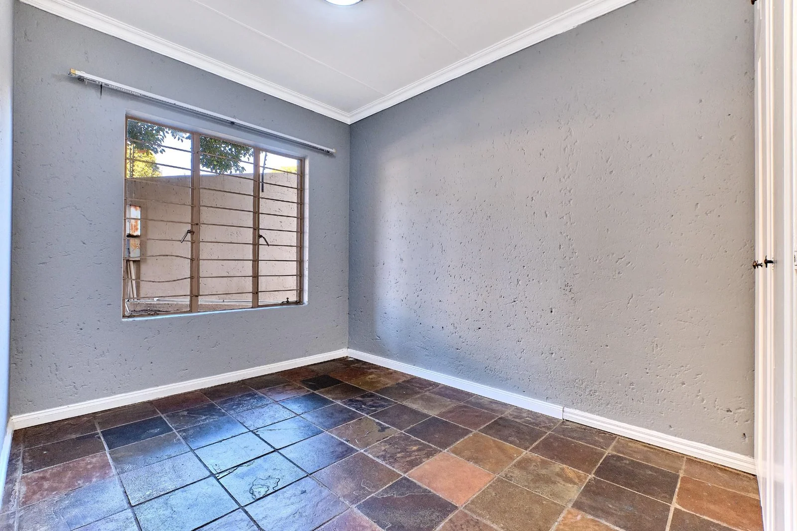 A Three- Bedroom Ground Floor Apartment in Weltevreden Park For Sale.