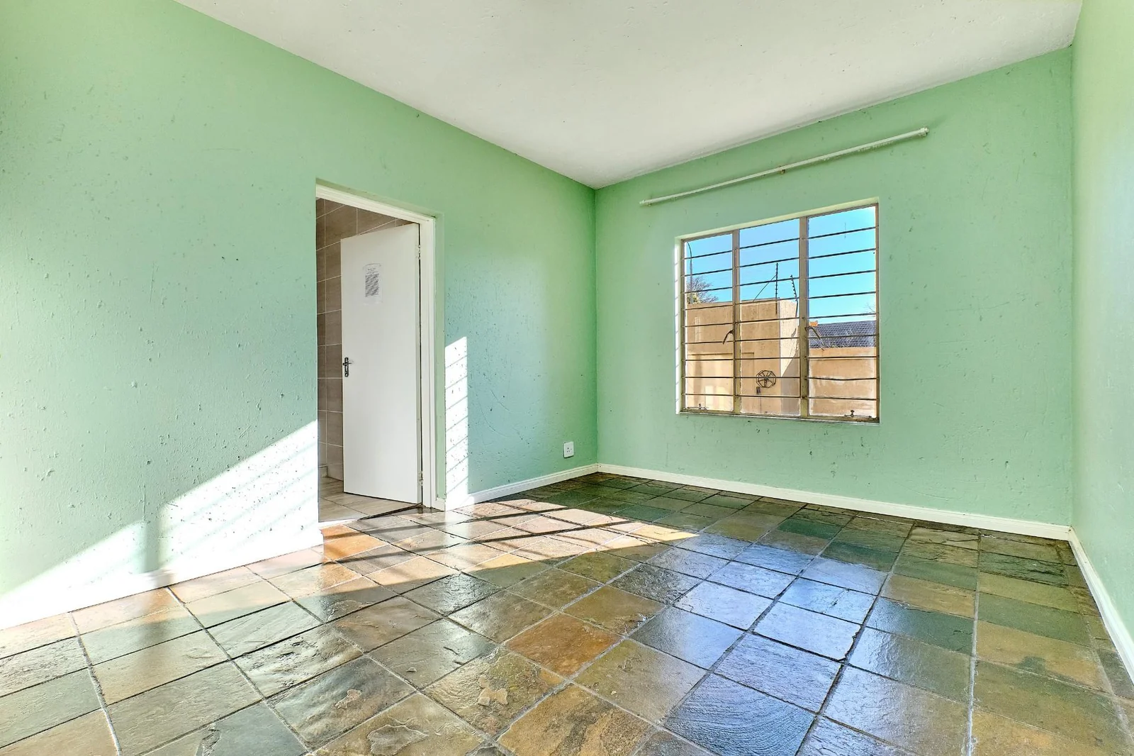 A Three- Bedroom Ground Floor Apartment in Weltevreden Park For Sale.