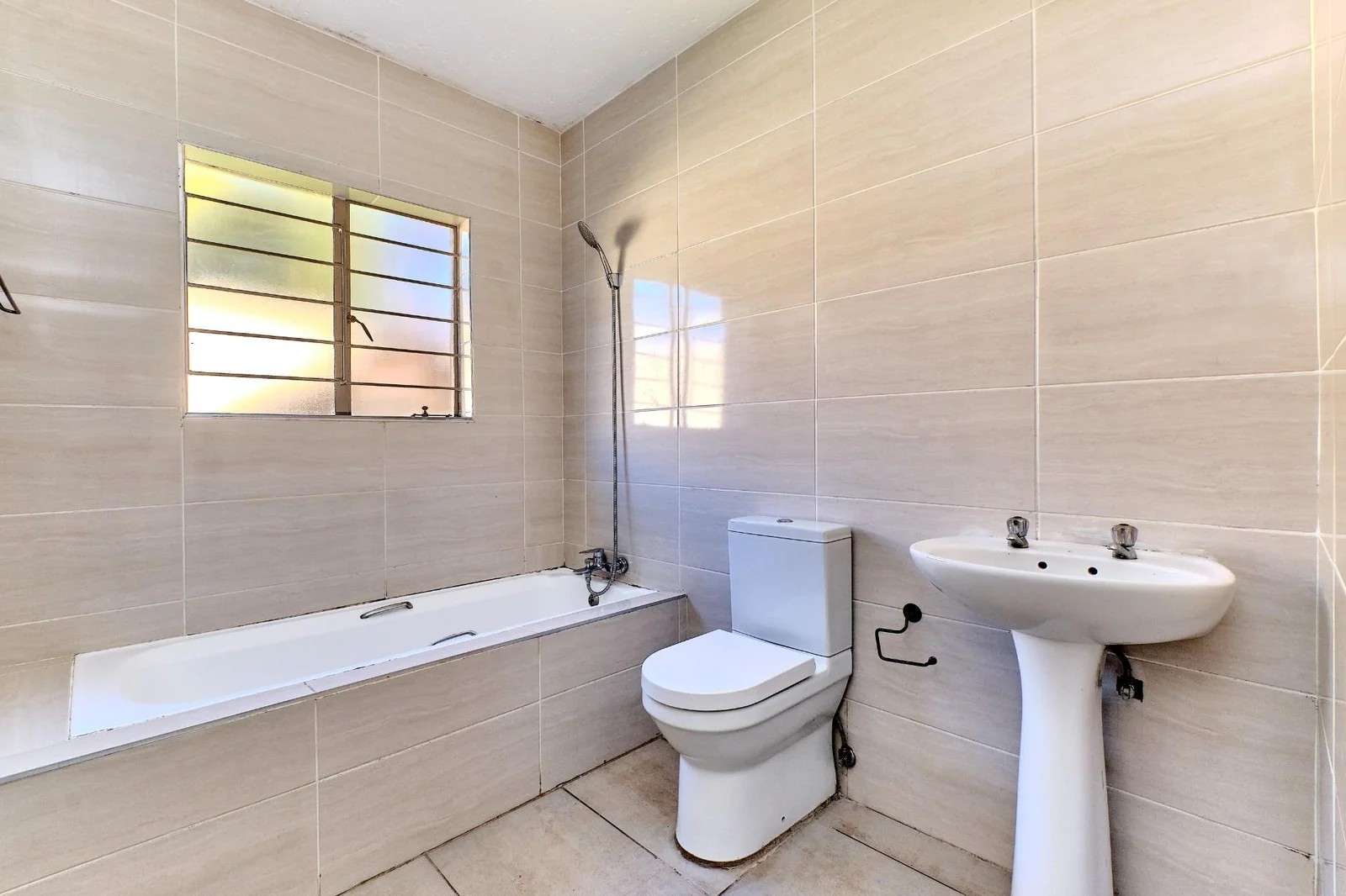 A Three- Bedroom Ground Floor Apartment in Weltevreden Park For Sale.