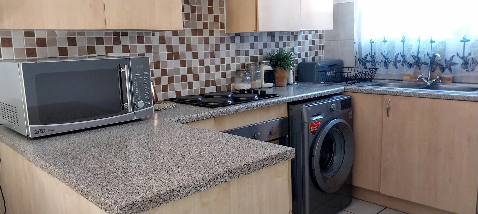 Cozy home with a Loft and a lock up Garage for sale in Halfway Gardens