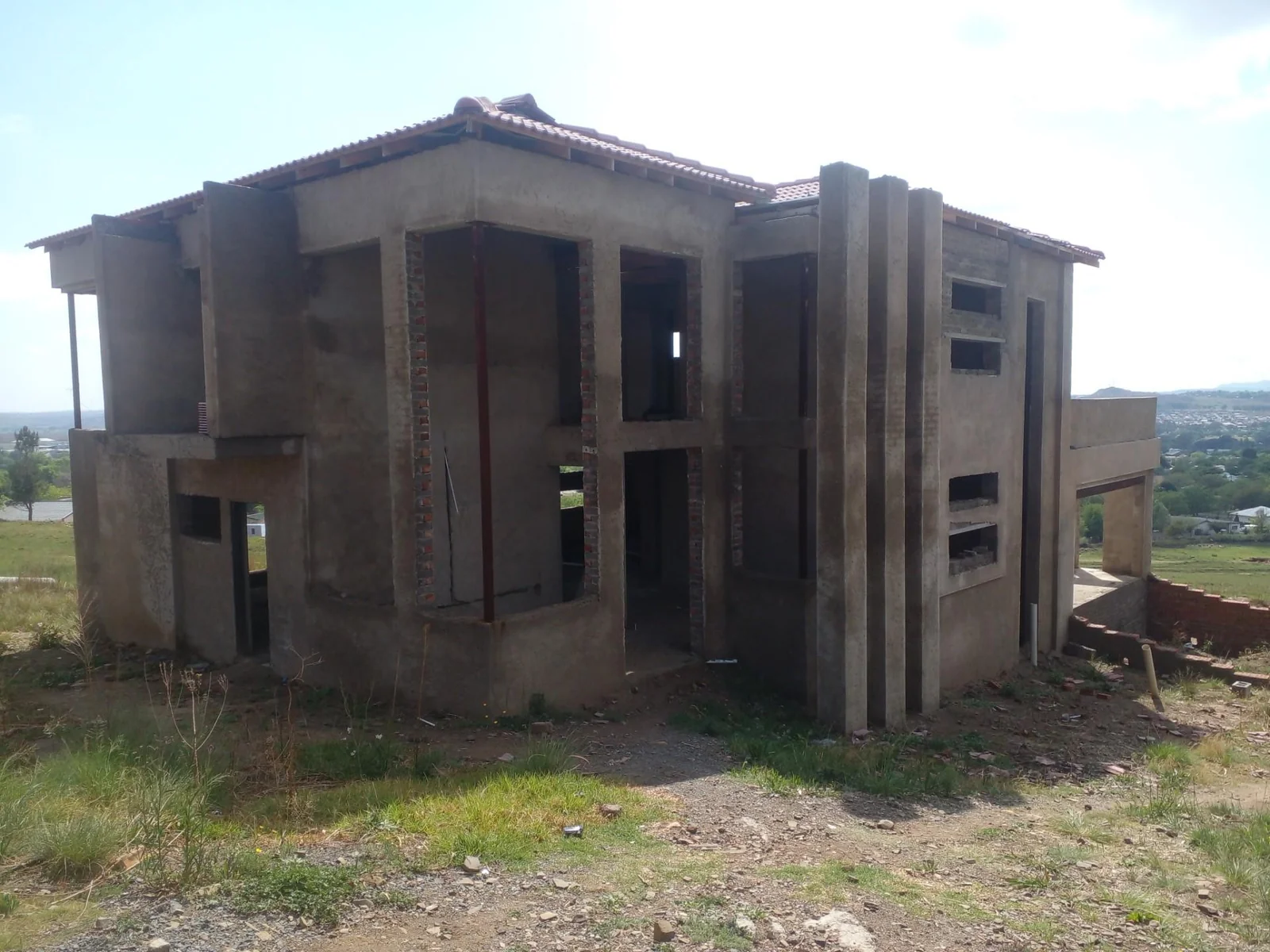 Unfinished 4 bedroom house for sale