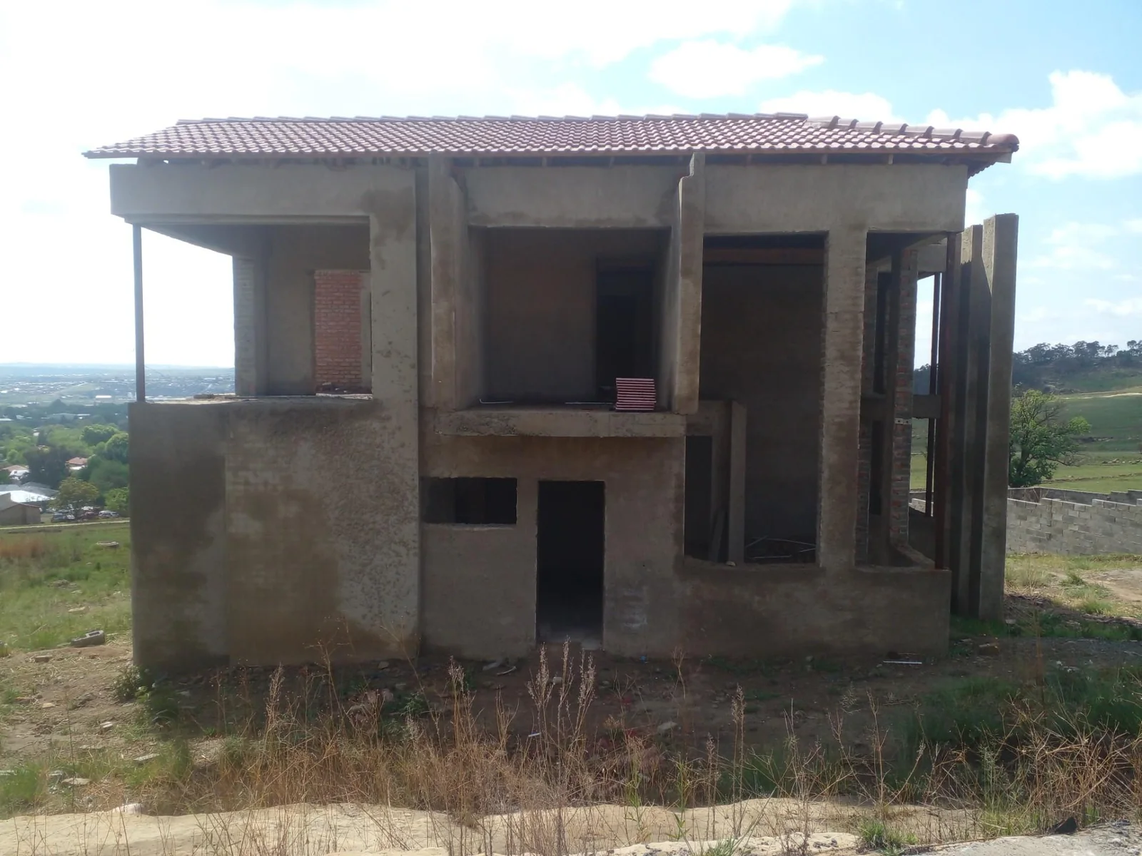 Unfinished 4 bedroom house for sale