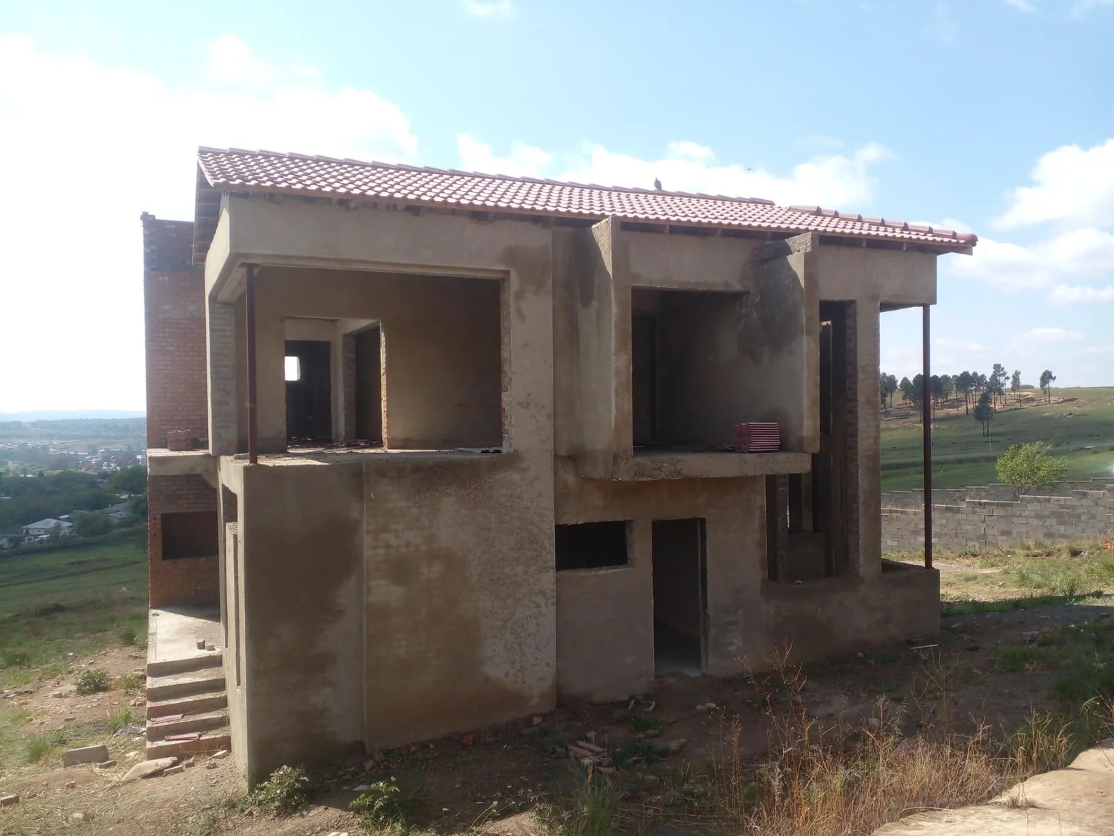 Unfinished 4 bedroom house for sale