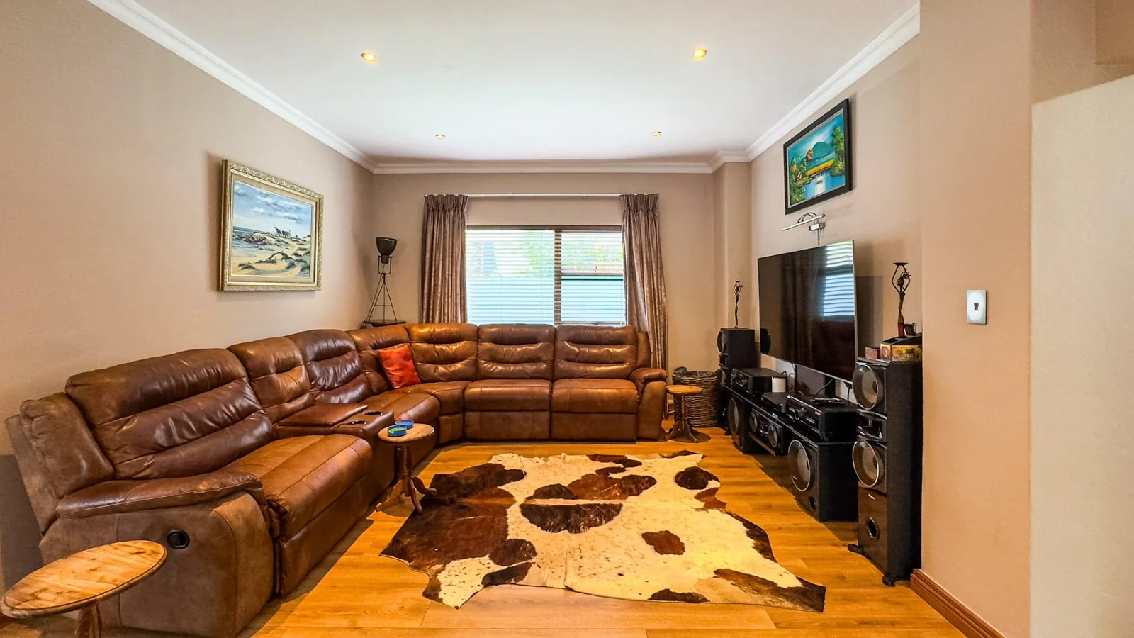 NEAT FAMILY HOME LOCATED IN A QUIET CUL-DE-SAC:   NEAR AN ACCESS GATE <br/>IN MIDSTREAM PROPER, YOU WILL BE AMAZED AT THE SPACE OF THE GARDENS.