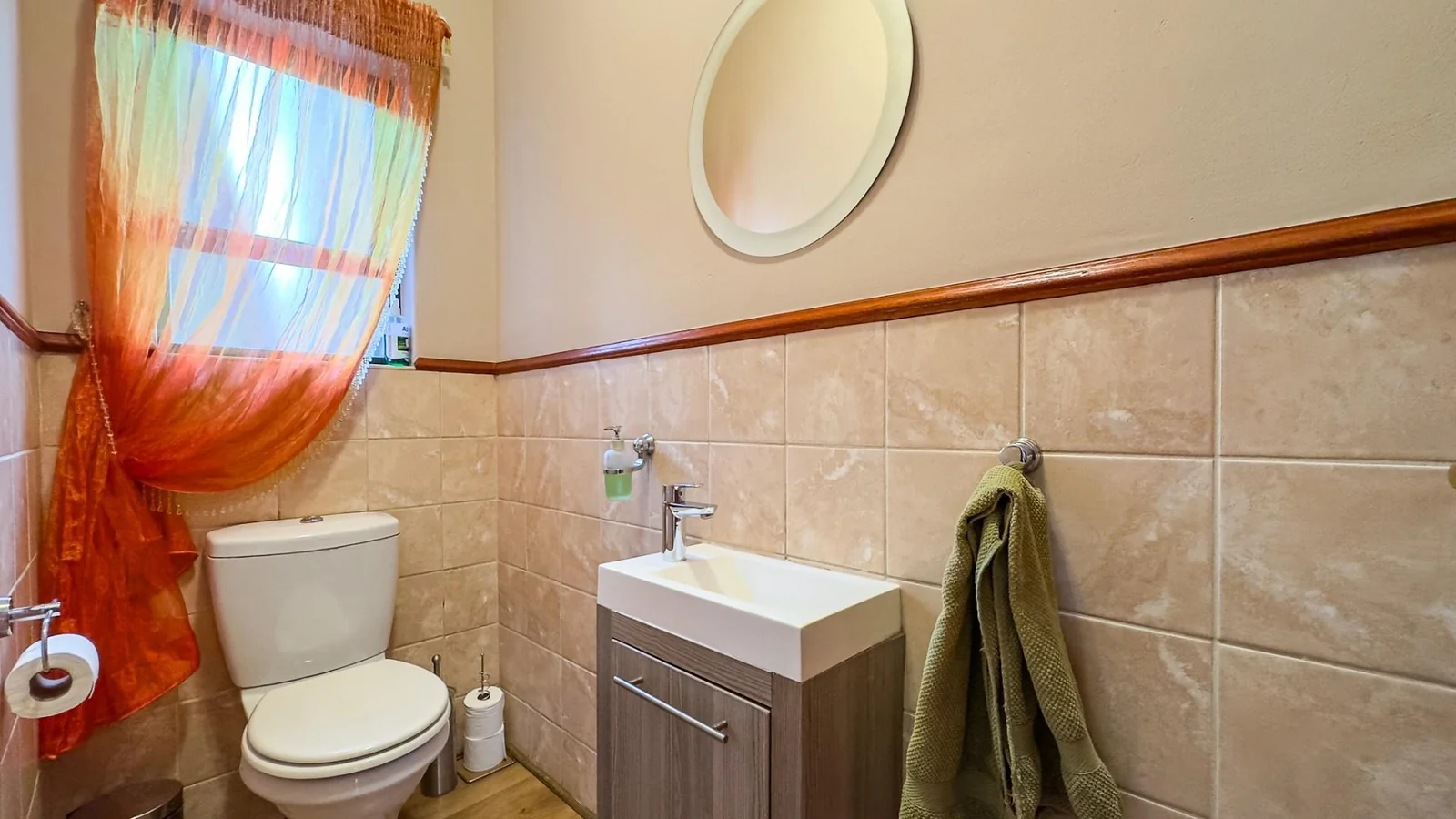 NEAT FAMILY HOME LOCATED IN A QUIET CUL-DE-SAC:   NEAR AN ACCESS GATE <br/>IN MIDSTREAM PROPER, YOU WILL BE AMAZED AT THE SPACE OF THE GARDENS.