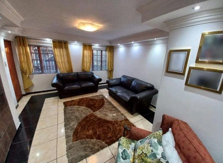 Spacious 4-Bedroom Double-Storey Home with Modern Comforts