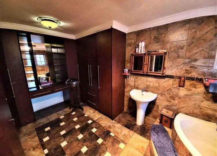 Spacious 4-Bedroom Double-Storey Home with Modern Comforts