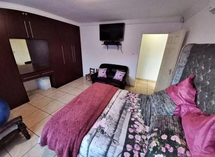 Spacious 4-Bedroom Double-Storey Home with Modern Comforts