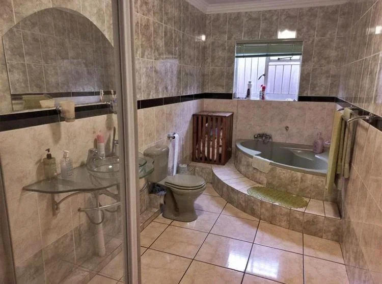 Spacious 4-Bedroom Double-Storey Home with Modern Comforts