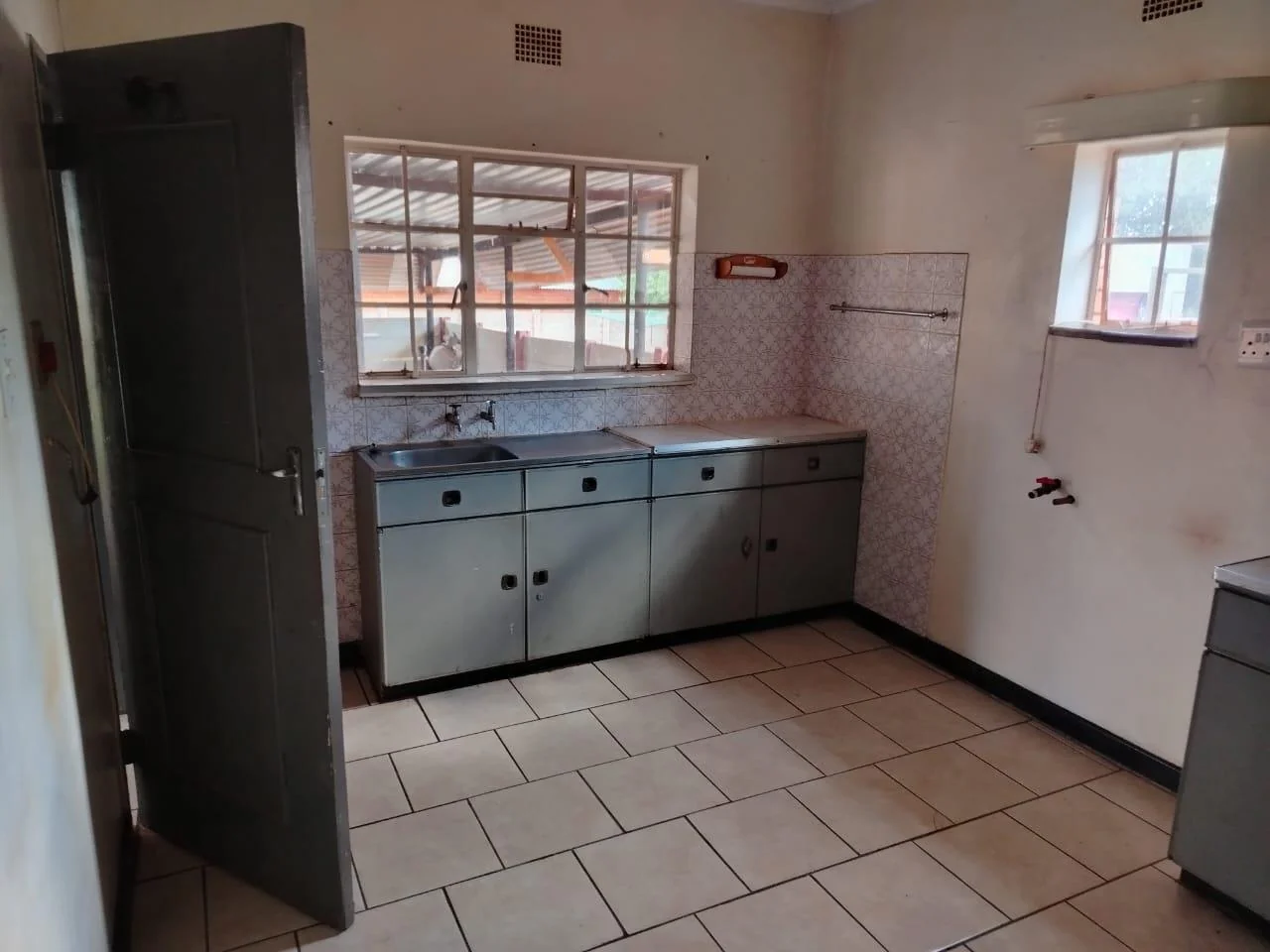 Spacious 3-Bedroom Home with Modern Security & Bonus Apartment