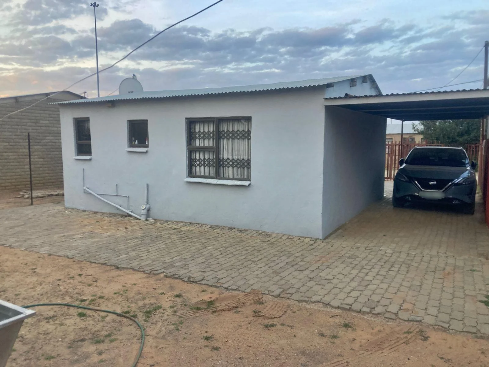 Charming 2-Bedroom Home with En-Suite, Covered Parking and Secure Yard