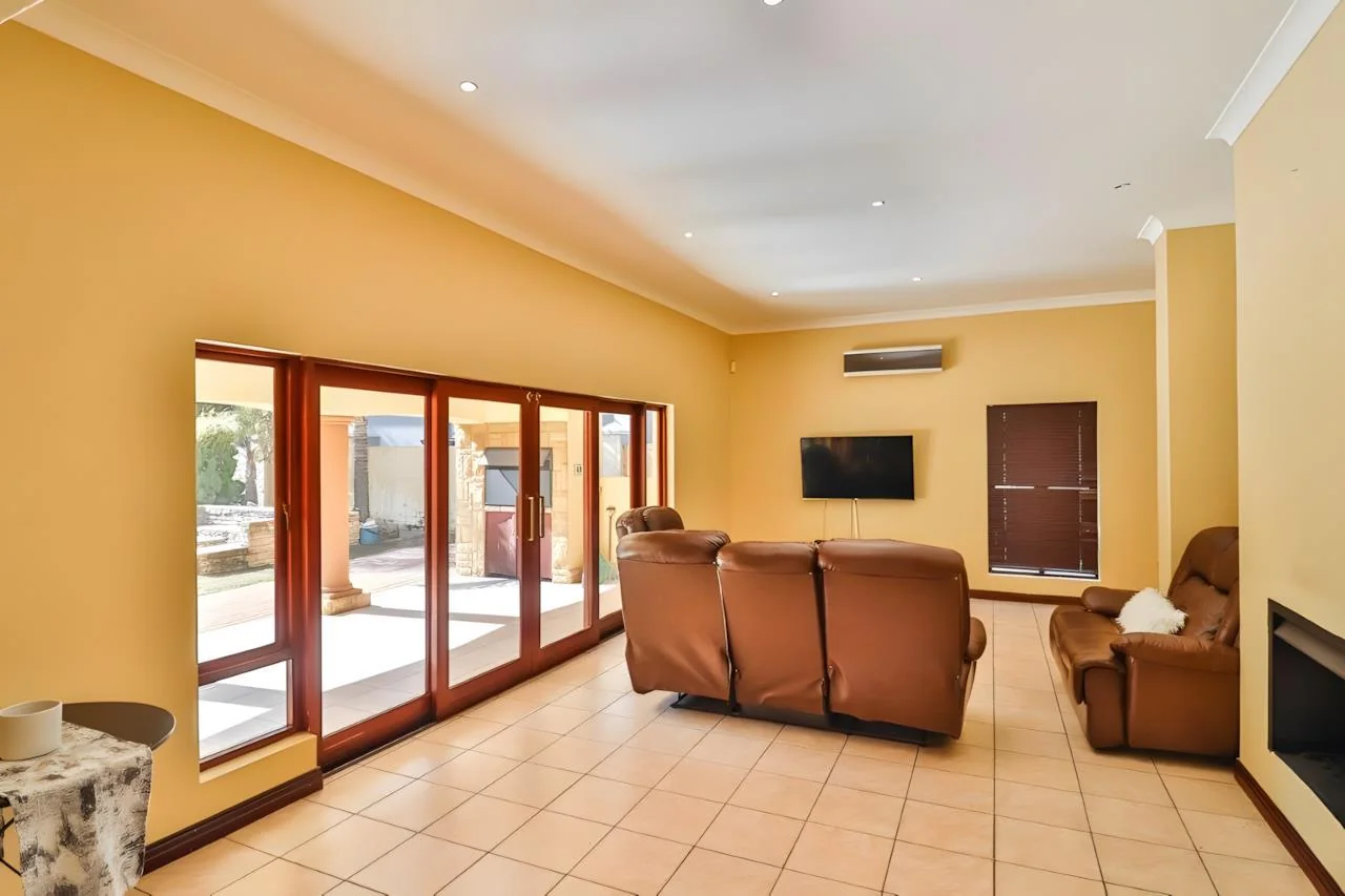 Elegant 4-Bedroom Tuscan-Style Home in Blue Valley Golf Estate – Secure Living with Pool, Jacuzzi & Scenic Luxury