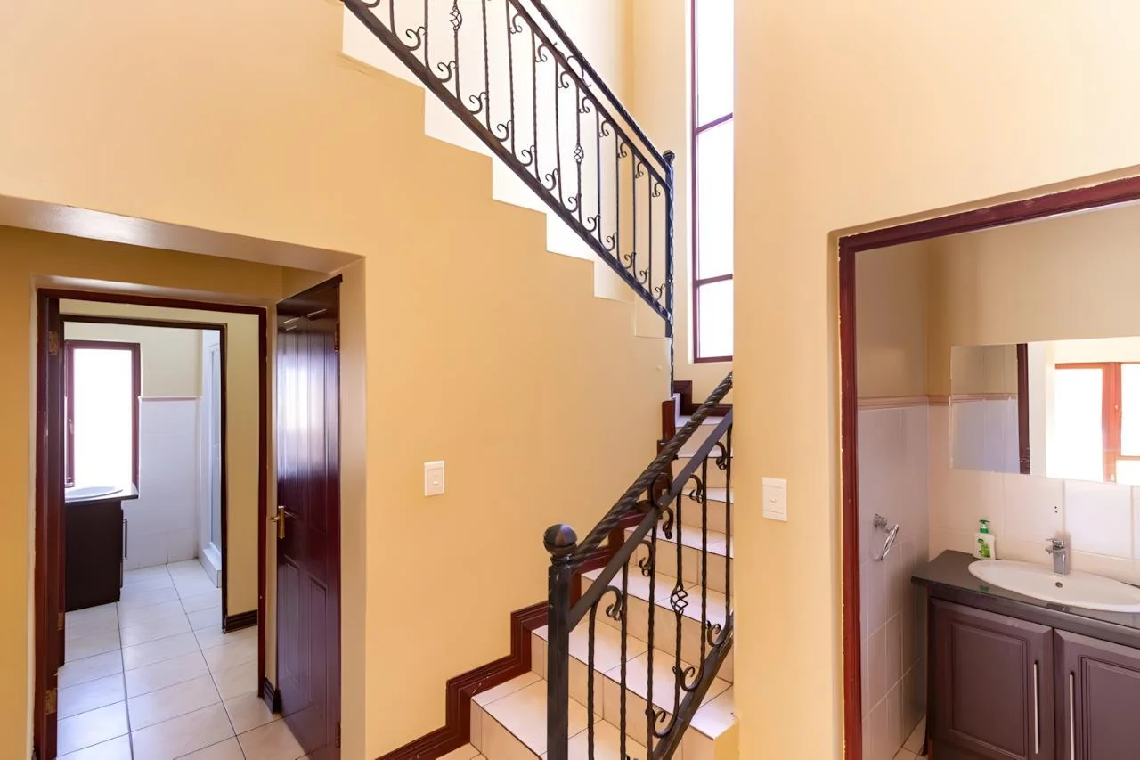 Elegant 4-Bedroom Tuscan-Style Home in Blue Valley Golf Estate – Secure Living with Pool, Jacuzzi & Scenic Luxury