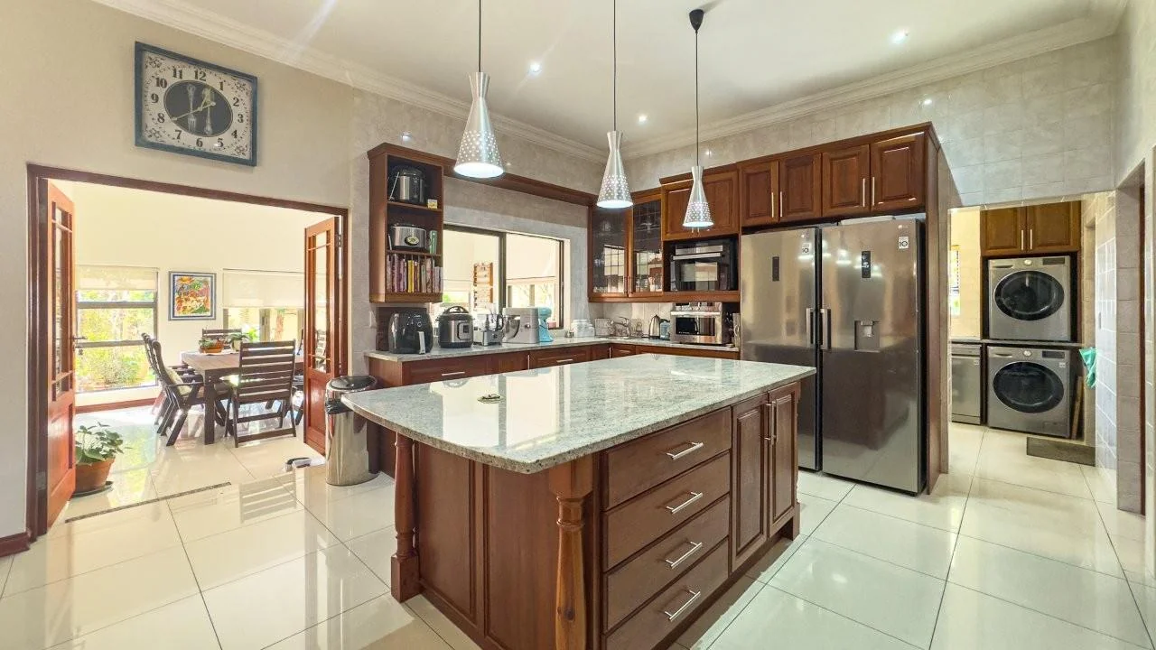 PRACTICAL DOUBLE LEVEL PROPERTY, SITUATED IN A PRIZED LOCATION OF MIDLANDS ESTATE