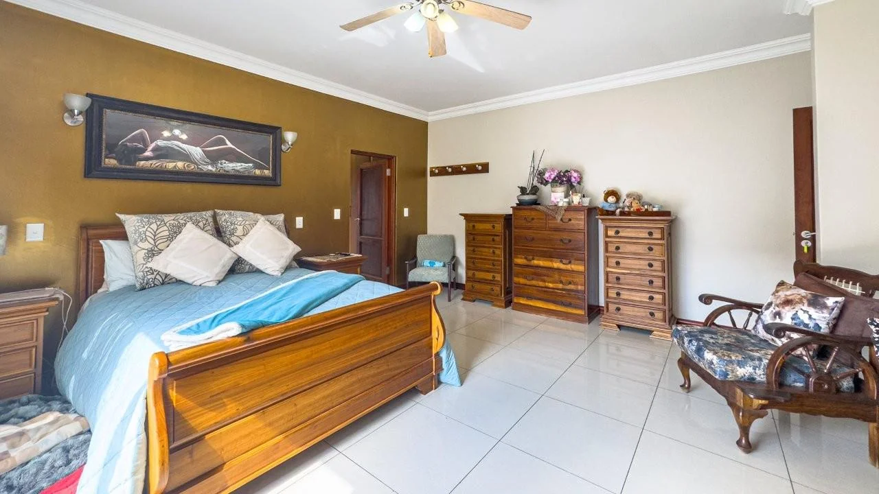 PRACTICAL DOUBLE LEVEL PROPERTY, SITUATED IN A PRIZED LOCATION OF MIDLANDS ESTATE