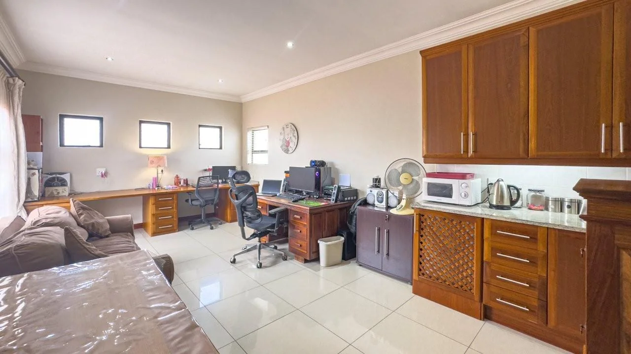 PRACTICAL DOUBLE LEVEL PROPERTY, SITUATED IN A PRIZED LOCATION OF MIDLANDS ESTATE