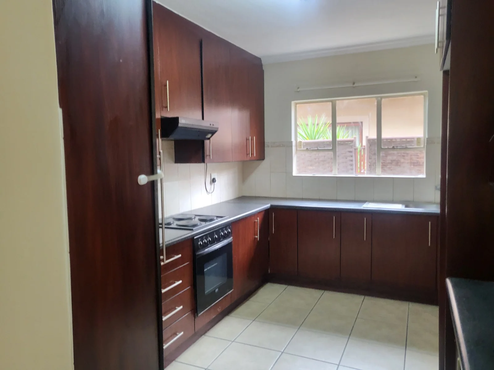Upmarket townhouse for sale in Risiville at a bargain price!