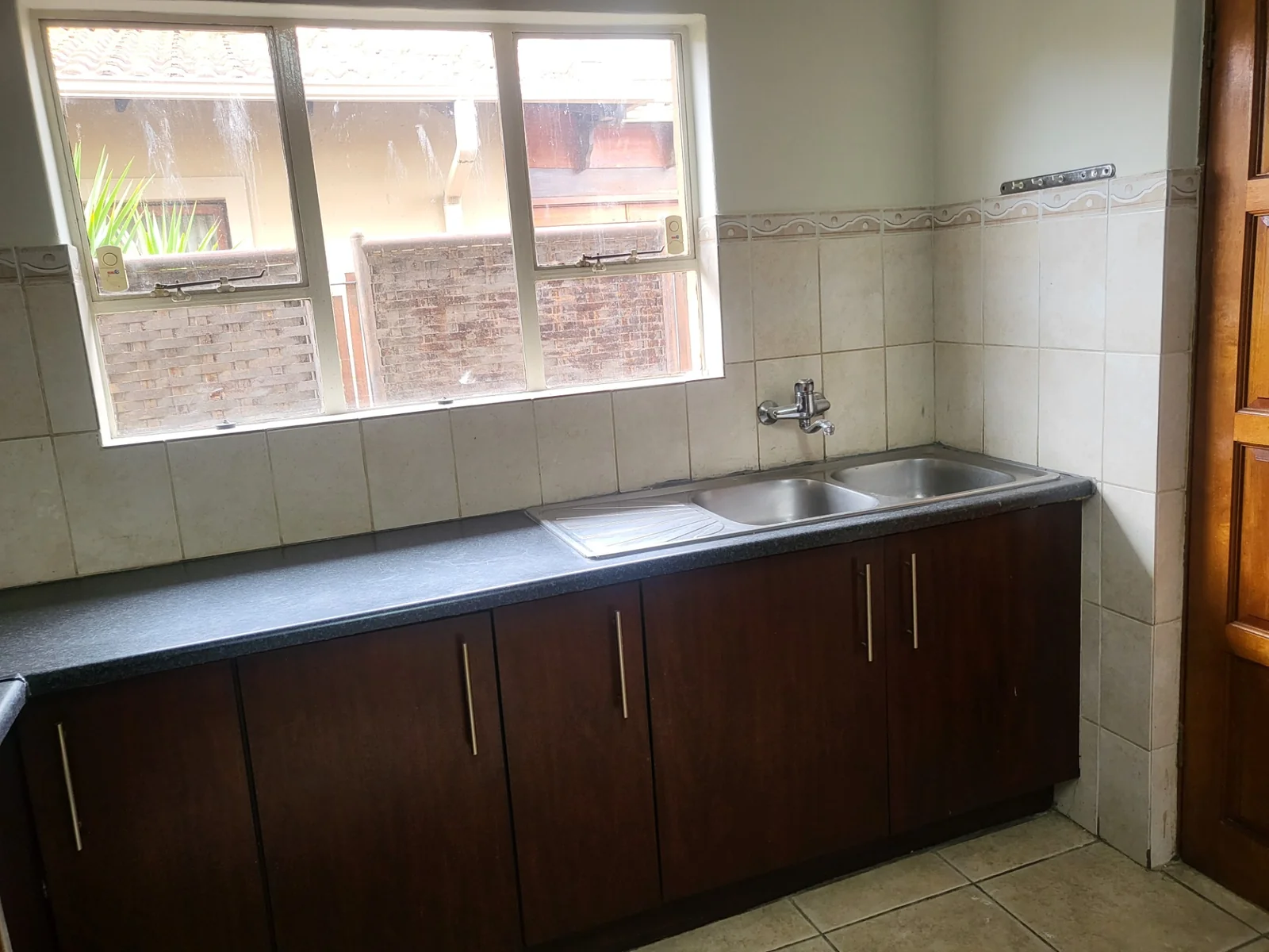 Upmarket townhouse for sale in Risiville at a bargain price!