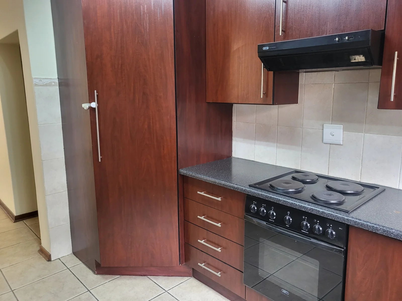 Upmarket townhouse for sale in Risiville at a bargain price!