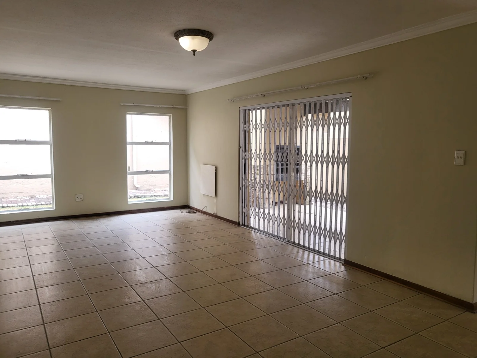 Upmarket townhouse for sale in Risiville at a bargain price!