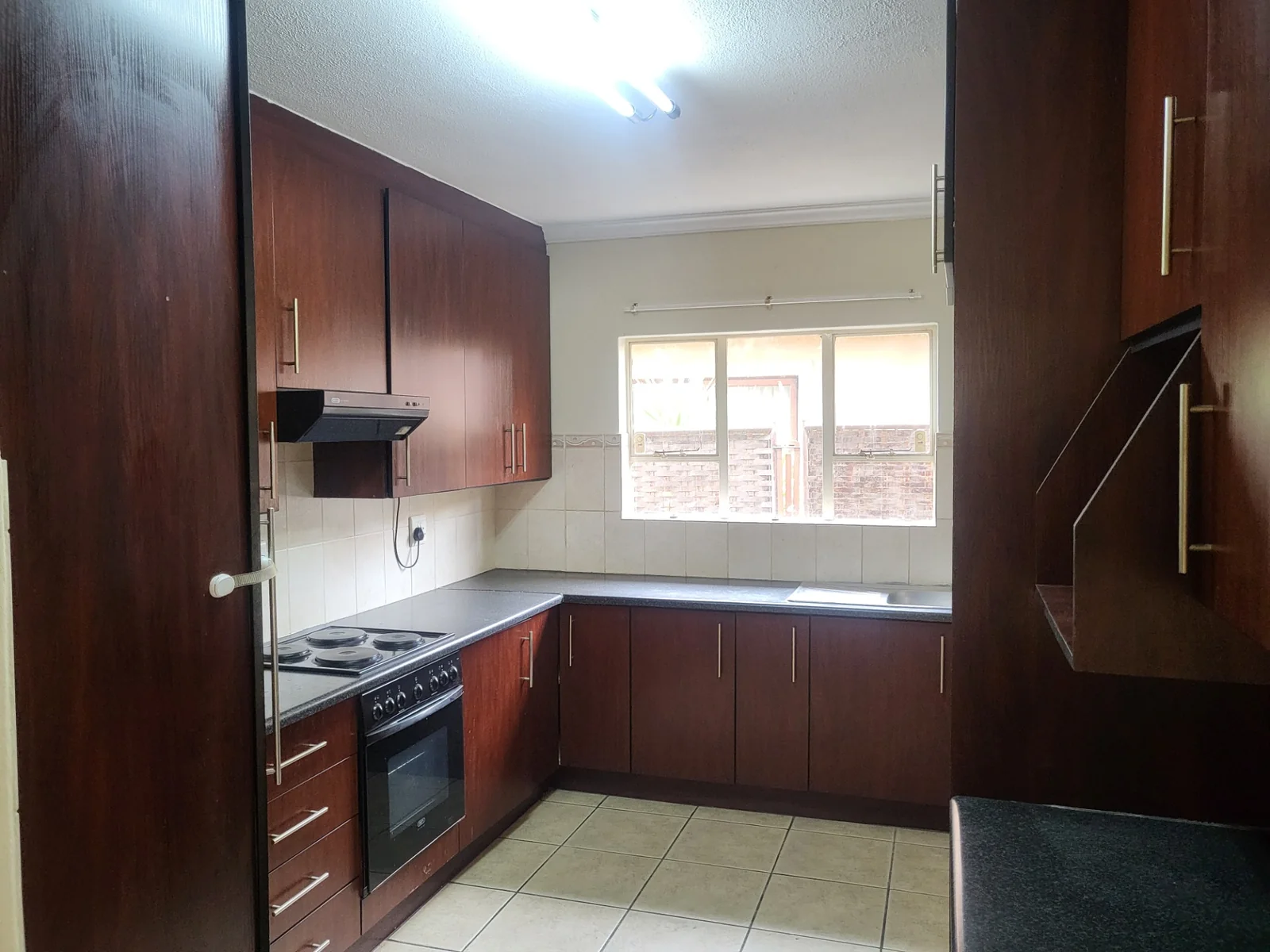 Upmarket townhouse for sale in Risiville at a bargain price!