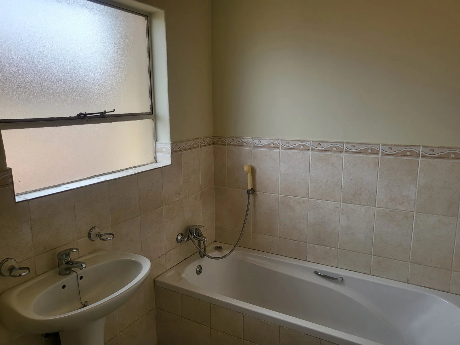 Upmarket townhouse for sale in Risiville at a bargain price!
