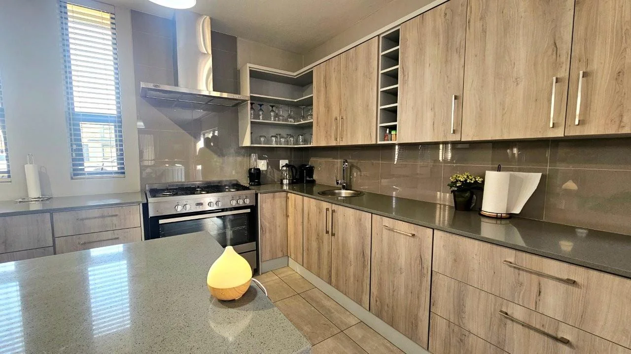 MODERN FINISHES, POOL, BIG PATIO LOTS OF LIGHT THAT FLOWS INTO THE KITCHEN, DINING AND LIVING AREAS.