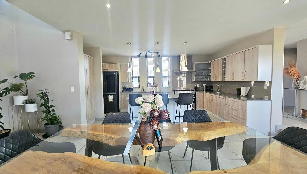 MODERN FINISHES, POOL, BIG PATIO LOTS OF LIGHT THAT FLOWS INTO THE KITCHEN, DINING AND LIVING AREAS.