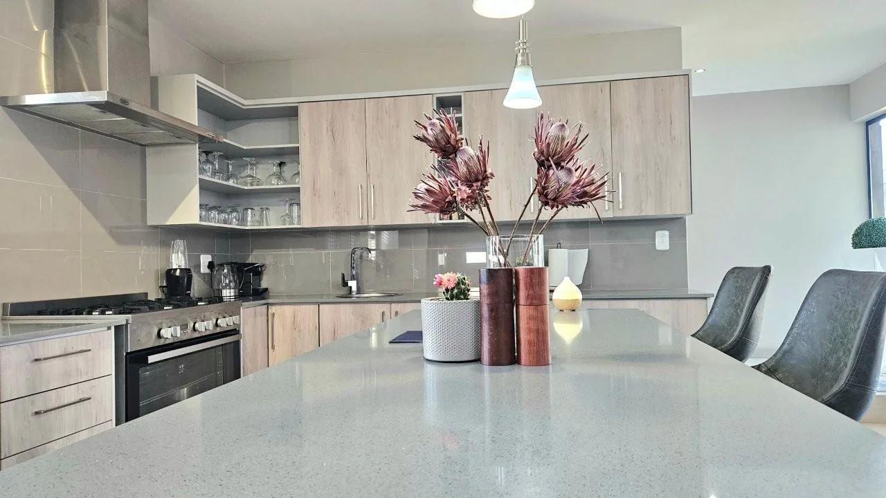 MODERN FINISHES, POOL, BIG PATIO LOTS OF LIGHT THAT FLOWS INTO THE KITCHEN, DINING AND LIVING AREAS.