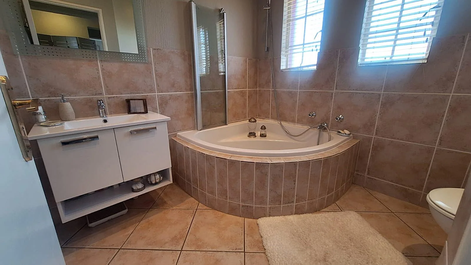 Modern Double-Storey Family Home with Solar, Water Tanks and Beautiful Garden.