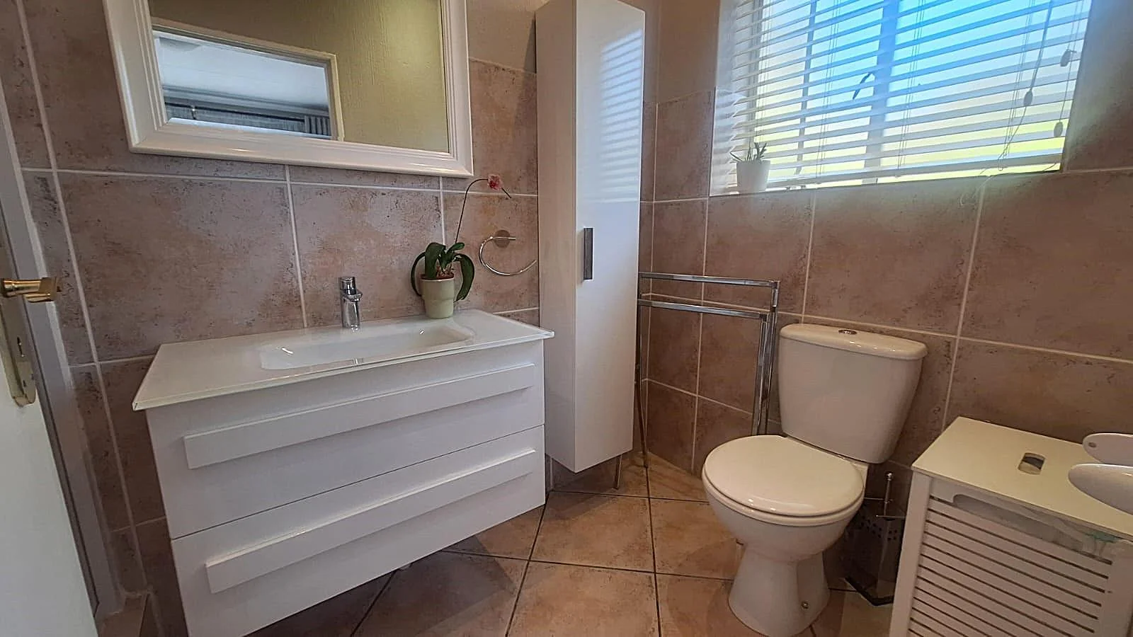 Modern Double-Storey Family Home with Solar, Water Tanks and Beautiful Garden.