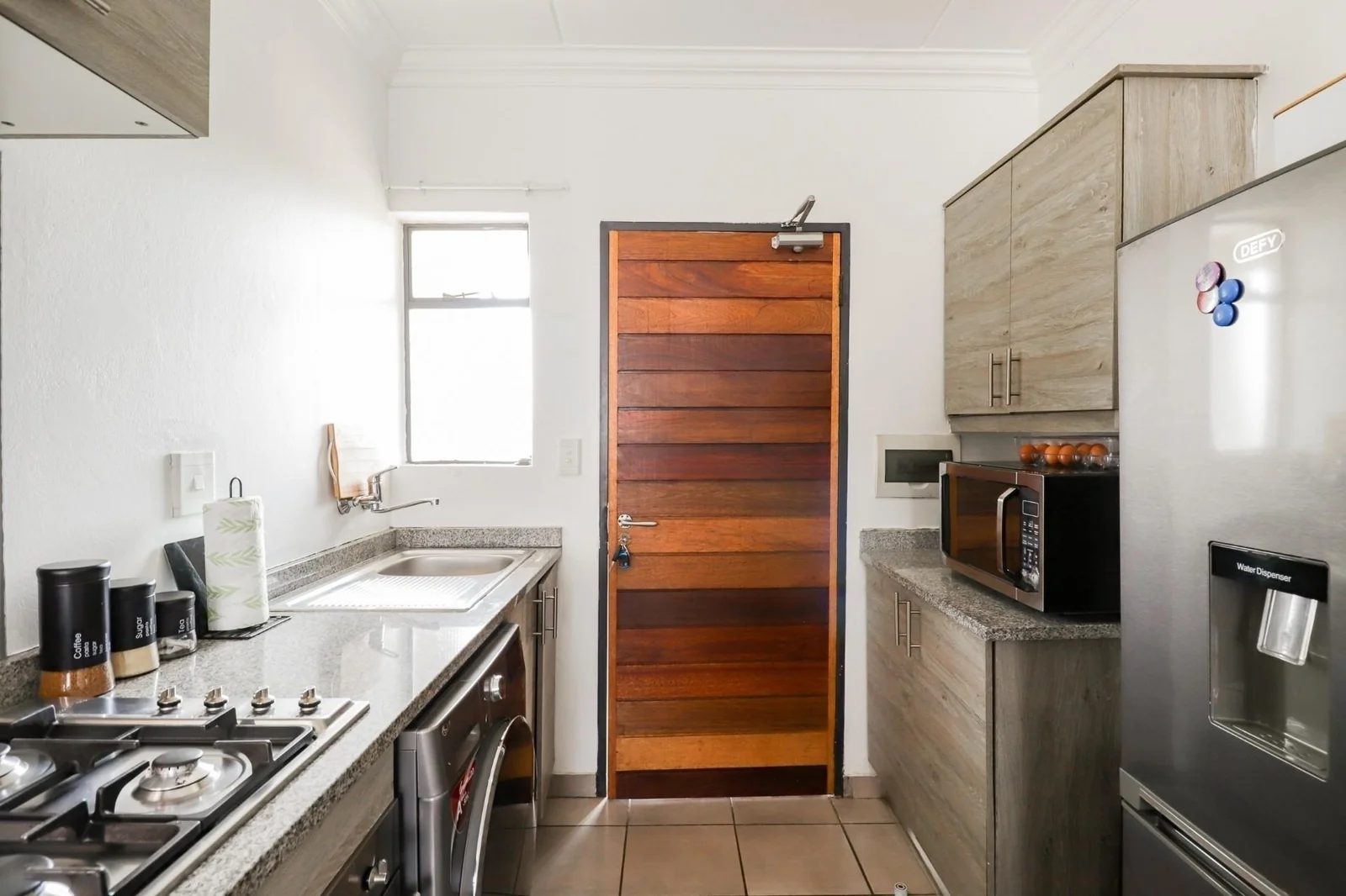 A charming 43-square-meter first-floor apartment, located in the heart of Noordwyk, Midrand,