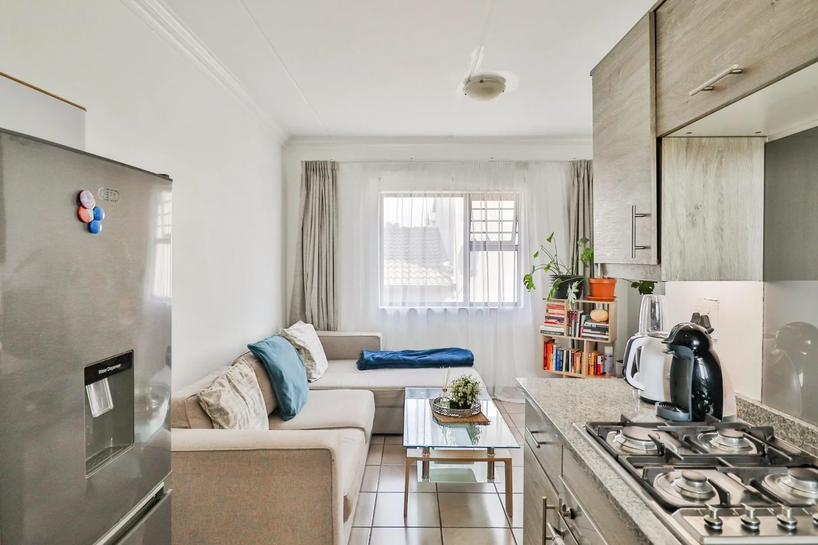 A charming 43-square-meter first-floor apartment, located in the heart of Noordwyk, Midrand,