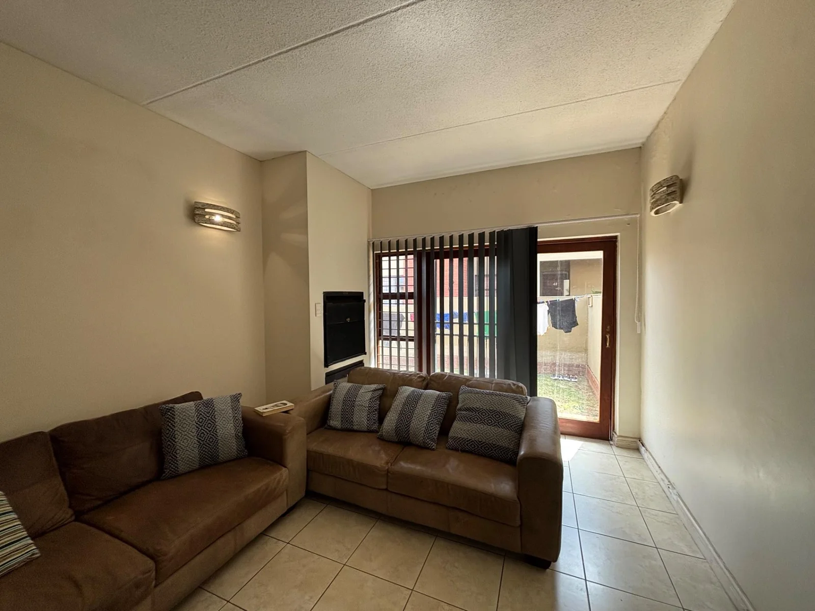 NEW LISTING .....DOWNSTAIRS TOWNHOUSE WITH GARDEN!