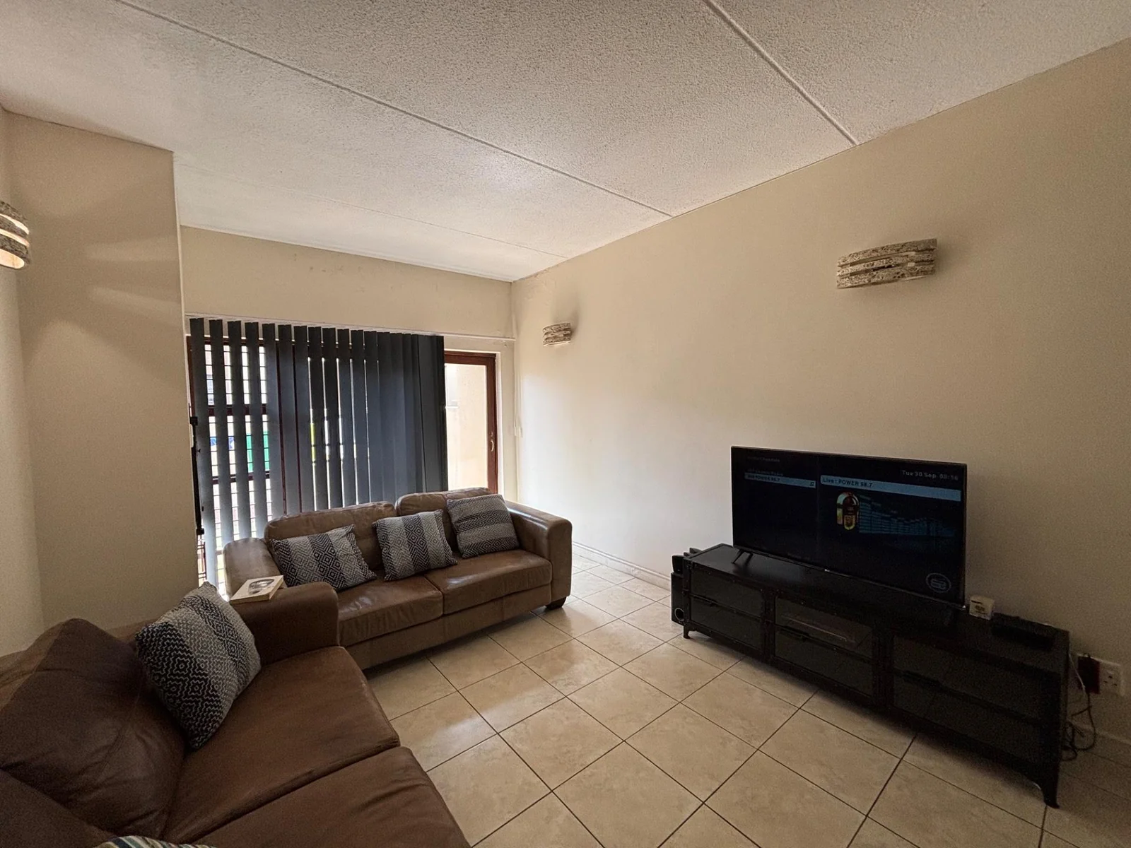 NEW LISTING .....DOWNSTAIRS TOWNHOUSE WITH GARDEN!