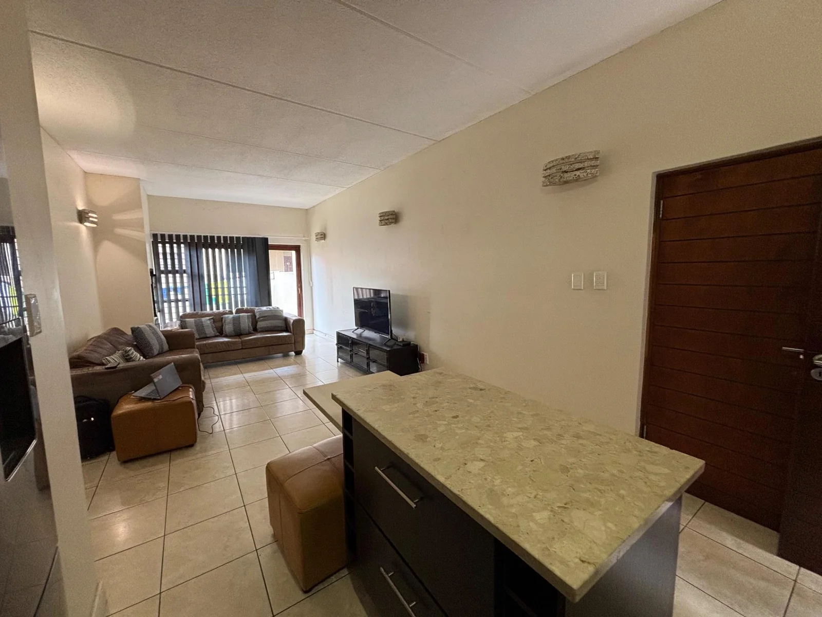 NEW LISTING .....DOWNSTAIRS TOWNHOUSE WITH GARDEN!