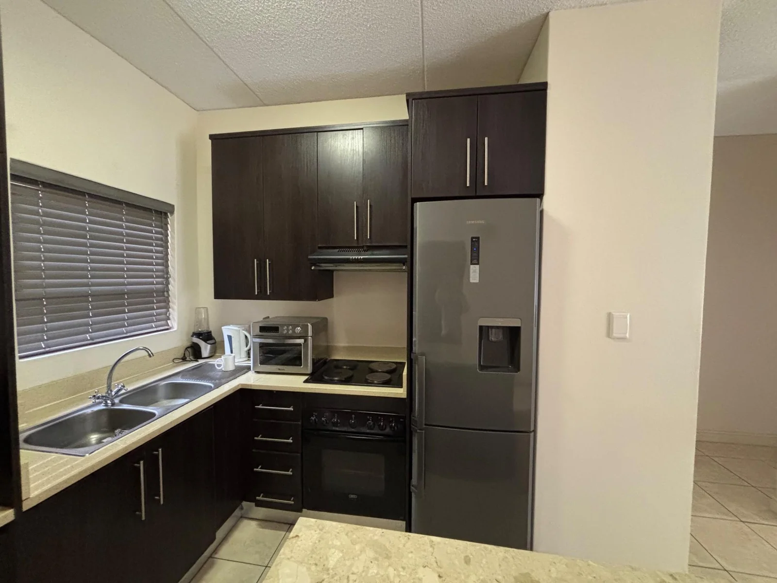 NEW LISTING .....DOWNSTAIRS TOWNHOUSE WITH GARDEN!