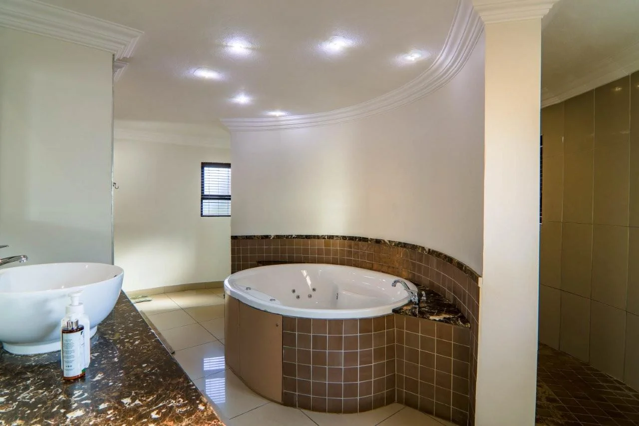 NEAT FACEBRICK PROPERTY IN MIDSTREAM PROPER : VERY CLOSE TO SCHOOLS