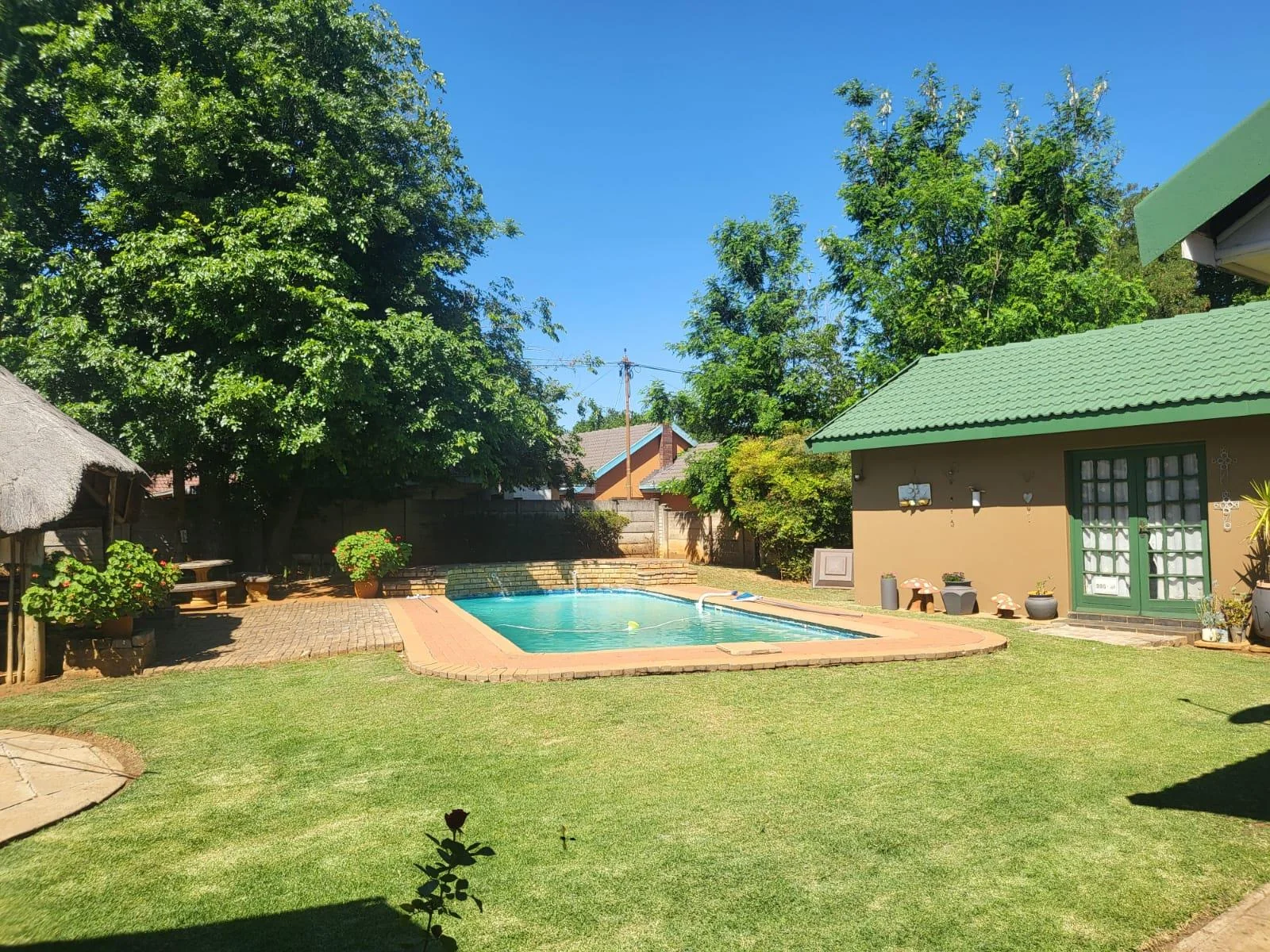 Reduced to sell!!  Well located family home with flatlet, swimming pool and salon area, for sale in Risiville.