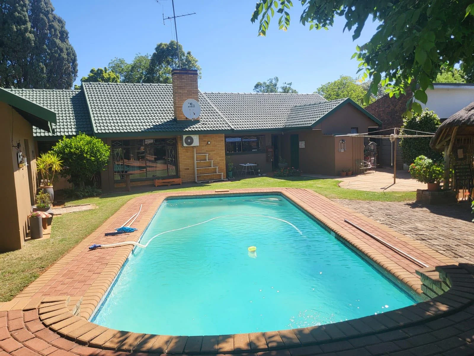 Reduced to sell!!  Well located family home with flatlet, swimming pool and salon area, for sale in Risiville.