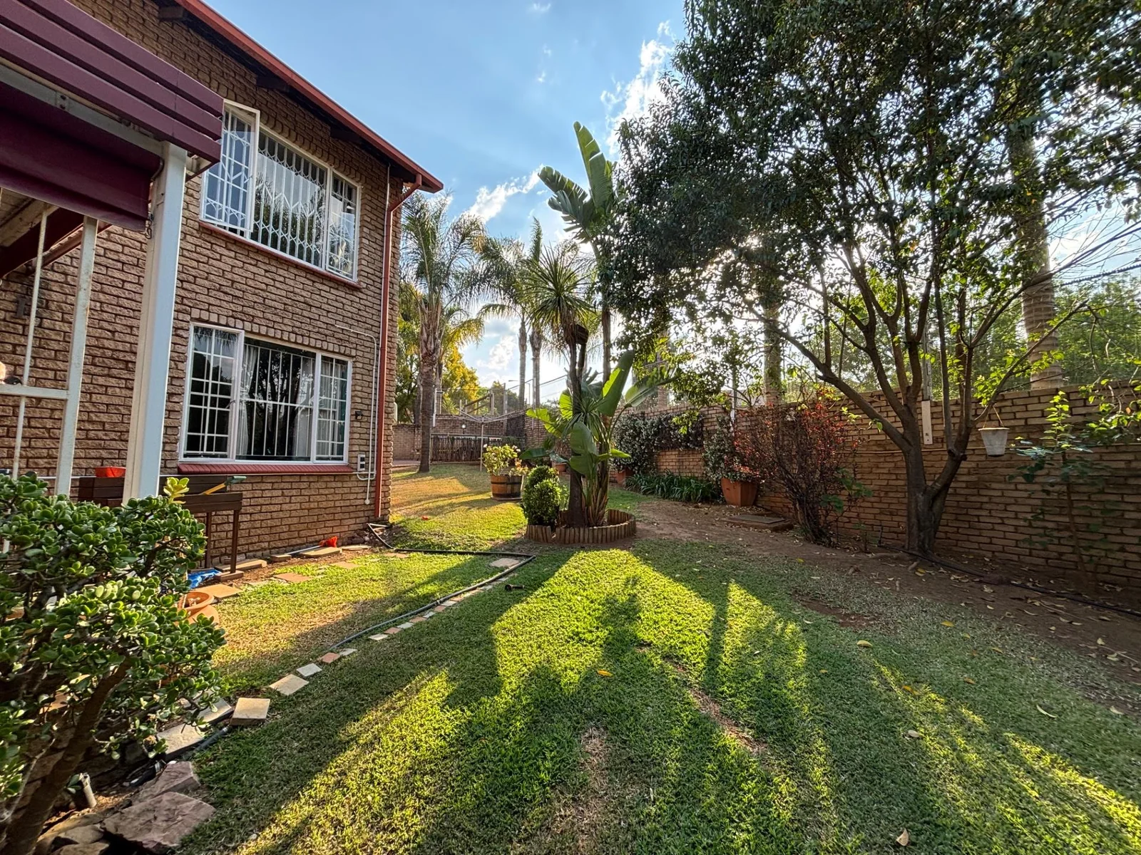 MAKE THIS ONE YOURS!! DUPLEX WITH LARGE GARDEN.