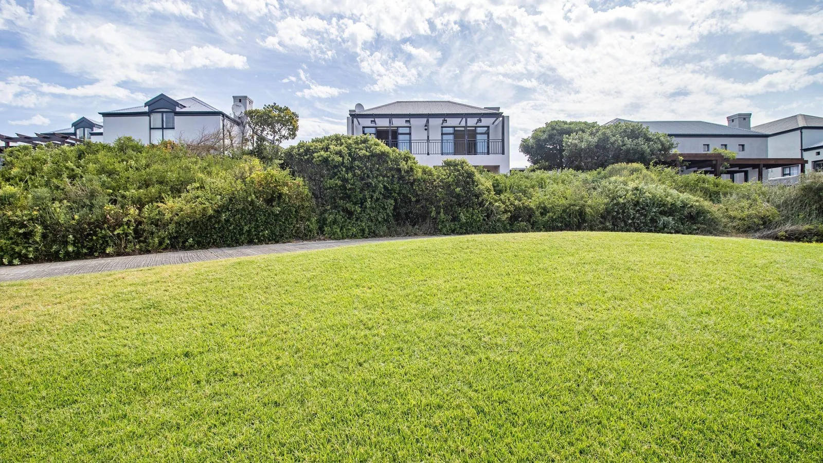 Spacious 3-Bedroom Home with Fairway Views in Secure Atlantic Beach Estate