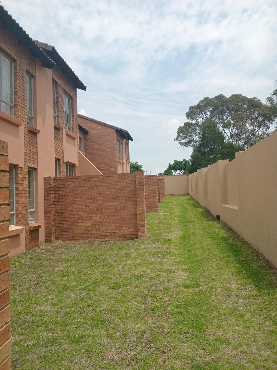A lovely 2 bed ground apartment with  a Lockup garage in Erand Gardens, Midrand.