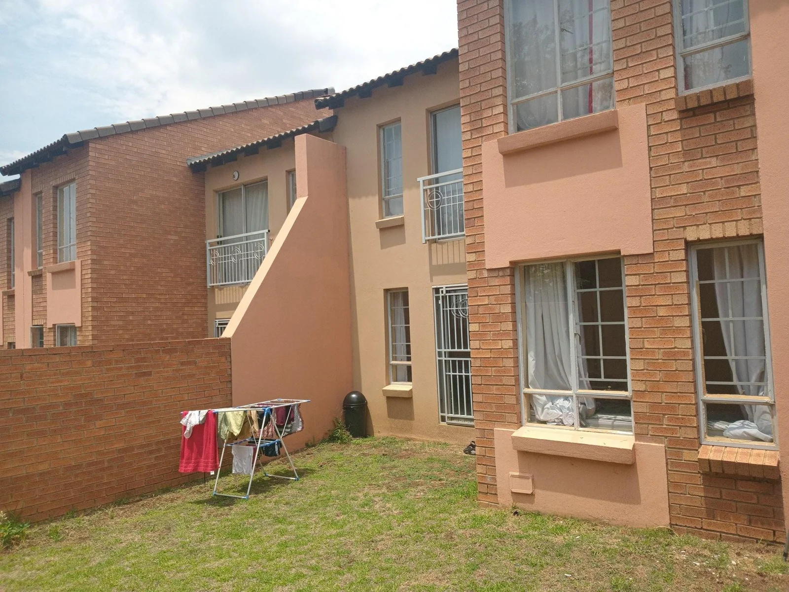 A lovely 2 bed ground apartment with  a Lockup garage in Erand Gardens, Midrand.